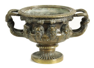 Lot 583 - A 19TH-CENTURY CAST BRONZE PEDESTAL BOWL MODELLED ON THE WARWICK VASE