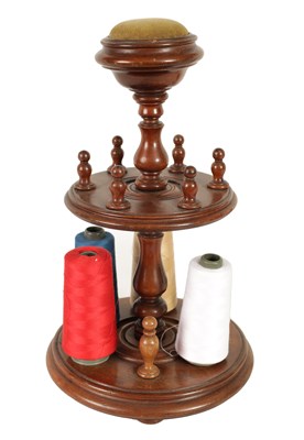 Lot 1143 - A 19TH CENTURY TURNED MAHOGANY BOBBIN STAND
