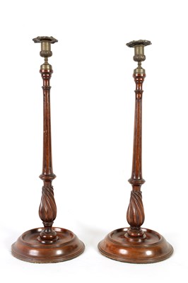 Lot 1125 - A LARGE PAIR OF LATE 19TH CENTURY TURNED MAHOGANY CANDLESTICKS