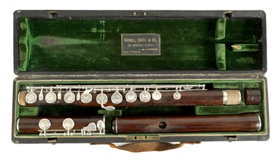 Lot 646 - A MID 19TH CENTURY WOODEN FLUTE BY RUDALL, CARTE & CO. NO. 385.