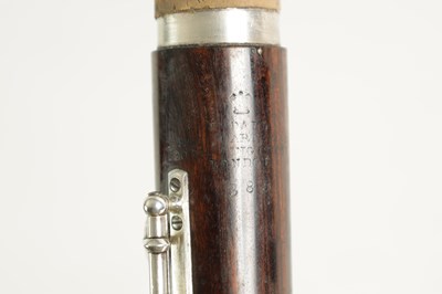 Lot 646 - A MID 19TH CENTURY WOODEN FLUTE BY RUDALL, CARTE & CO. NO. 385.