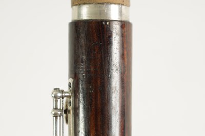Lot 646 - A MID 19TH CENTURY WOODEN FLUTE BY RUDALL, CARTE & CO. NO. 385.