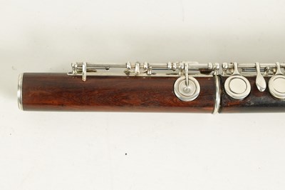 Lot 646 - A MID 19TH CENTURY WOODEN FLUTE BY RUDALL, CARTE & CO. NO. 385.