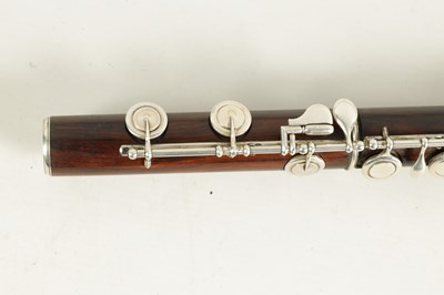 Lot 646 - A MID 19TH CENTURY WOODEN FLUTE BY RUDALL, CARTE & CO. NO. 385.
