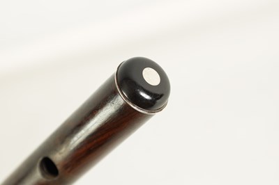 Lot 646 - A MID 19TH CENTURY WOODEN FLUTE BY RUDALL, CARTE & CO. NO. 385.