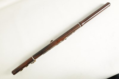 Lot 646 - A MID 19TH CENTURY WOODEN FLUTE BY RUDALL, CARTE & CO. NO. 385.