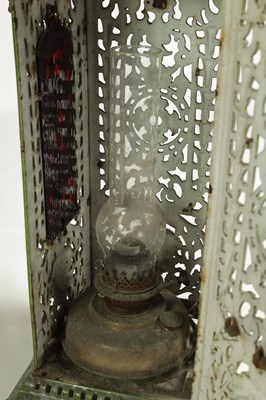 Lot 601 - A 19TH CENTURY CAST IRON OIL BURNER/HEATER