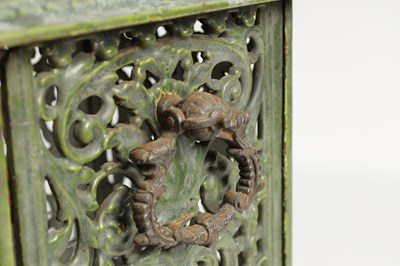 Lot 601 - A 19TH CENTURY CAST IRON OIL BURNER/HEATER