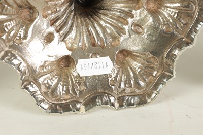 Lot 247 - A FINE SET OF FOUR GEORGE III LARGE CAST SILVER TABLE CANDLE STICKS IN THE ROCOCO MANNER
