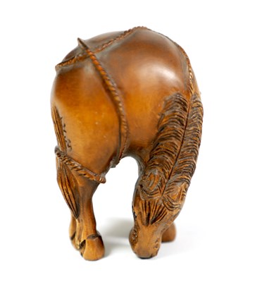 Lot 146 - AN ORIENTAL BOXWOOD NETSUKE OF A HORSE