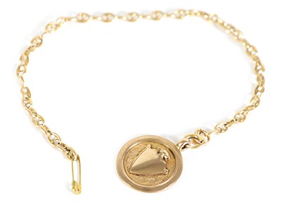 Lot 192 - A 1920’S 9CT GOLD WATCH CHAIN AND FOB