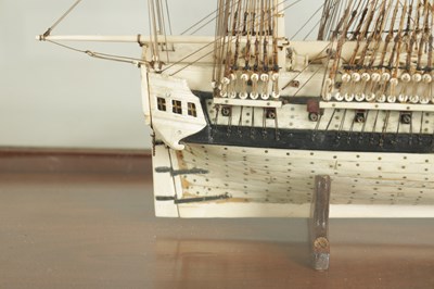Lot 607 - A LARGE 19TH CENTURY FRENCH NAPOLEONIC PRISONER-OF-WAR BONE MODEL OF THE 34-GUN U.S FRIGATE RALEIGH