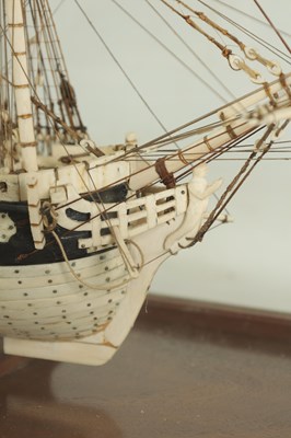 Lot 607 - A LARGE 19TH CENTURY FRENCH NAPOLEONIC PRISONER-OF-WAR BONE MODEL OF THE 34-GUN U.S FRIGATE RALEIGH