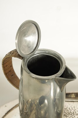 Lot 573 - AN EARLY 20TH CENTURY ARCHIBALD KNOX FOR LIBERTY AND CO. TUDRIC PEWTER TEA SET