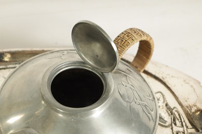 Lot 573 - AN EARLY 20TH CENTURY ARCHIBALD KNOX FOR LIBERTY AND CO. TUDRIC PEWTER TEA SET