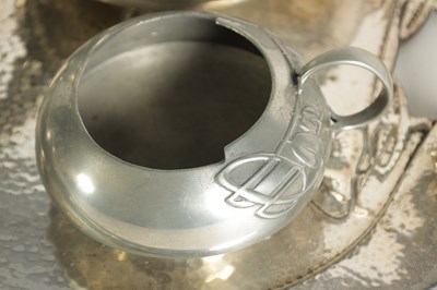 Lot 573 - AN EARLY 20TH CENTURY ARCHIBALD KNOX FOR LIBERTY AND CO. TUDRIC PEWTER TEA SET