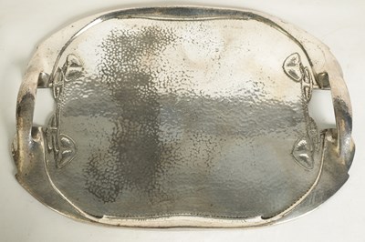 Lot 573 - AN EARLY 20TH CENTURY ARCHIBALD KNOX FOR LIBERTY AND CO. TUDRIC PEWTER TEA SET