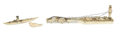 Lot 157 - A COLLECTION OF 19TH CENTURY INUIT CARVED BONE SCULPTURES