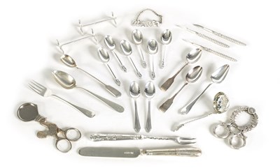 Lot 258 - A LARGE COLLECTION OF SILVER PLATED CUTLERY INCLUDING TWO BOILED EGG SCISSORS AND A PAIR OF KNIFE RESTS