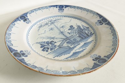 Lot 69 - AN 18TH-CENTURY DELFT BLUE AND WHITE PLATE