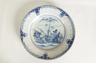 Lot 69 - AN 18TH-CENTURY DELFT BLUE AND WHITE PLATE