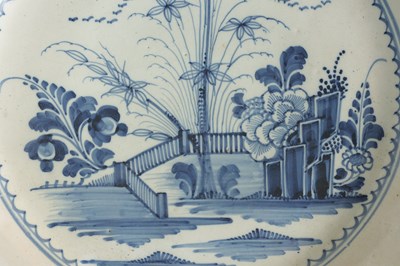 Lot 69 - AN 18TH-CENTURY DELFT BLUE AND WHITE PLATE