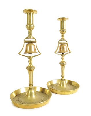 Lot 540 - A PAIR OF 19TH-CENTURY TALL BRASS TAVERN CANDLESTICKS