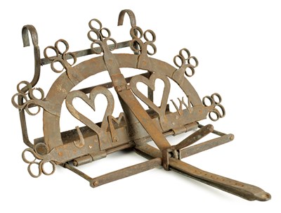 Lot 533 - AN 18TH/19TH CENTURY IRONWORK HANGING FIREFRONT MARRIAGE TRIVET