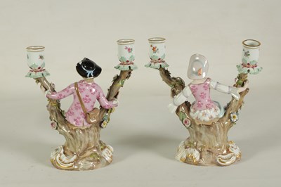 Lot 68 - A PAIR OF MID/LATE 19TH CENTURY MEISSEN FIGURAL TWO-BRANCH CANDELABRA