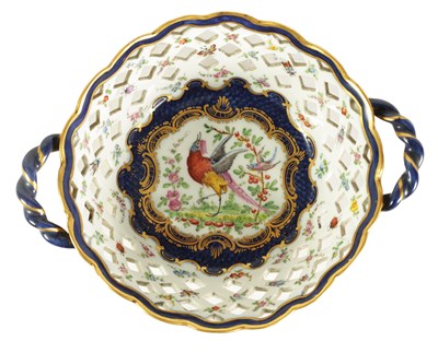 Lot 53 - A 19TH CENTURY FIRST PERIOD WORCESTER TYPE TWO-HANDLED LATTICEWORK BASKET