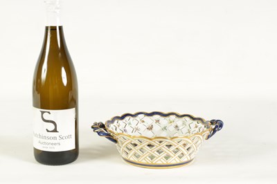 Lot 30 - A 19TH CENTURY FIRST PERIOD WORCESTER TYPE TWO-HANDLED LATTICEWORK BASKET