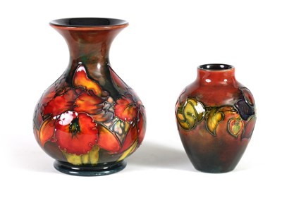 Lot 86 - TWO MOORCROFT FLAMBÉ WARE CABINET VASES