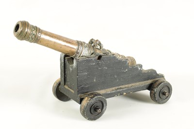 Lot 591 - A 17TH-CENTURY CAST BELL METAL STARTING CANNON DATED 1653
