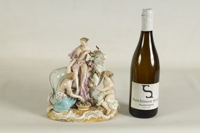 Lot 80 - A 19TH CENTURY MEISSEN FIGURE GROUP OF A BULL WITH A SEATED LADY RIDER AND A FLOWER SELLER