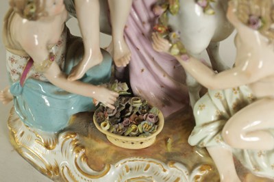 Lot 80 - A 19TH CENTURY MEISSEN FIGURE GROUP OF A BULL WITH A SEATED LADY RIDER AND A FLOWER SELLER