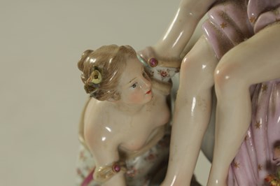 Lot 80 - A 19TH CENTURY MEISSEN FIGURE GROUP OF A BULL WITH A SEATED LADY RIDER AND A FLOWER SELLER
