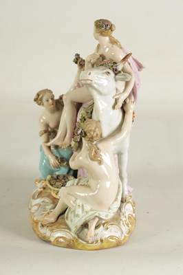 Lot 80 - A 19TH CENTURY MEISSEN FIGURE GROUP OF A BULL WITH A SEATED LADY RIDER AND A FLOWER SELLER