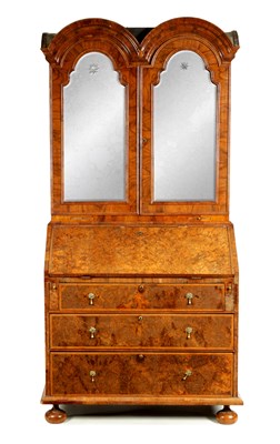 Lot 1043 - A WILLIAM AND MARY FIGURED WALNUT DOUBLE DOME TOP BUREAU BOOKCASE