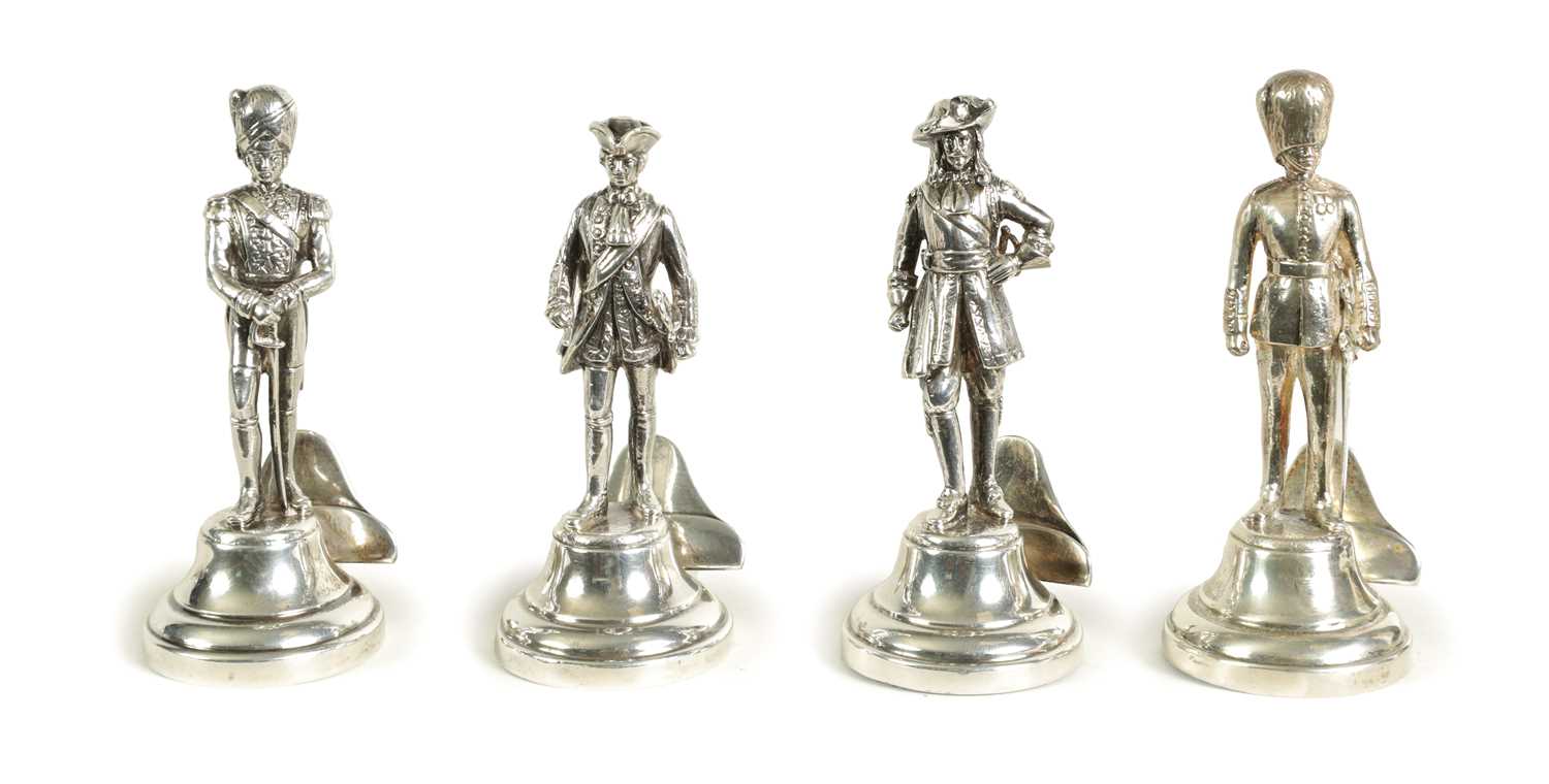 Lot 354 - A SET OF FOUR LARGE SILVER FIGURAL MENU HOLDERS