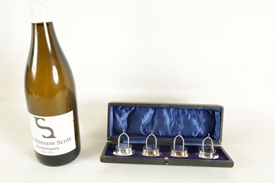 Lot 331 - A CASED SET OF FOUR SILVER WISH BONE MENU HOLDERS