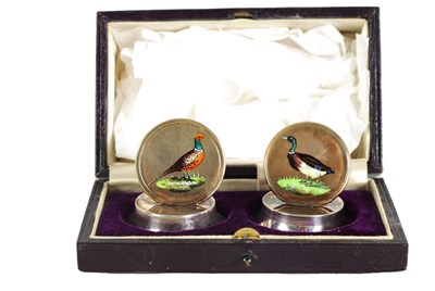 Lot 399 - A FINE CASED PAIR OF SILVER GILT AND ENAMEL GAME BIRD MENU HOLDERS