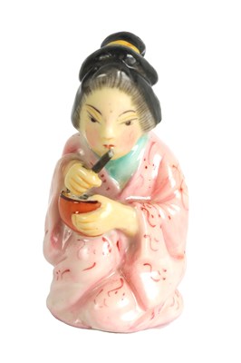 Lot 38 - JAPANESE GIRL. A RARE ROYAL WORCESTER CANDLE EXTINGUISHER