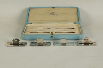 Lot 402 - A CASED SET OF FOUR ASPREY ART DECO SILVER MENU HOLDERS