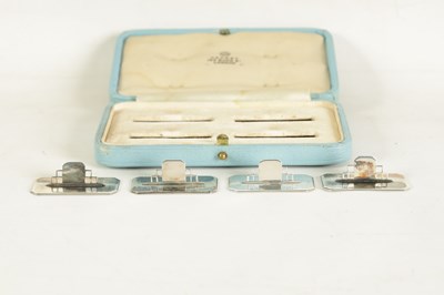 Lot 402 - A CASED SET OF FOUR ASPREY ART DECO SILVER MENU HOLDERS