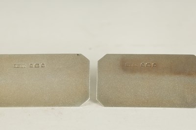 Lot 402 - A CASED SET OF FOUR ASPREY ART DECO SILVER MENU HOLDERS