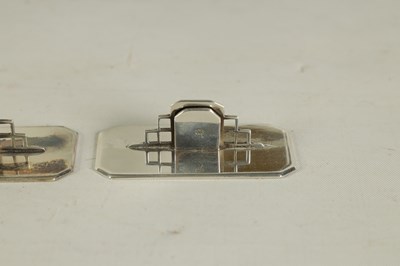 Lot 402 - A CASED SET OF FOUR ASPREY ART DECO SILVER MENU HOLDERS