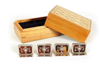 Lot 407 - A BOXED SET OF FOUR SILVER AND TORTOISESHELL RECTANGULAR MENU HOLDERS