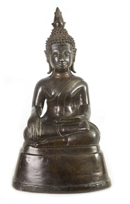 Lot 220 - A 17TH CENTURY TIBETAN BRONZE SEATED BUDDHA