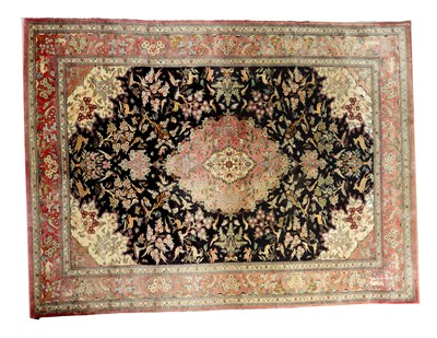 Lot 606 - A GOOD 20TH CENTURY EASTERN SILKEN FABRIC RUG OF COLOURFUL DESIGN
