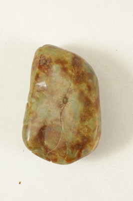 Lot 102 - A CHINESE RUSSET JADE CARVED AND PIERCED SCULPTURE